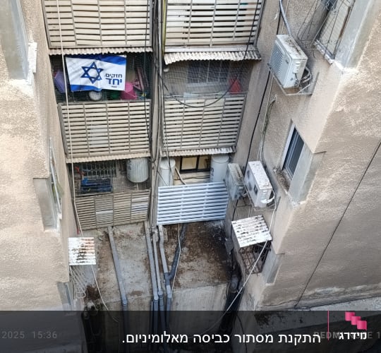 התקנת מסתור כביסה מאלומיניום.